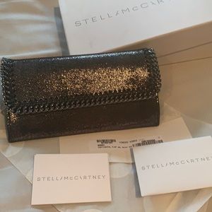 Stella McCartney wallet shiny slate color.